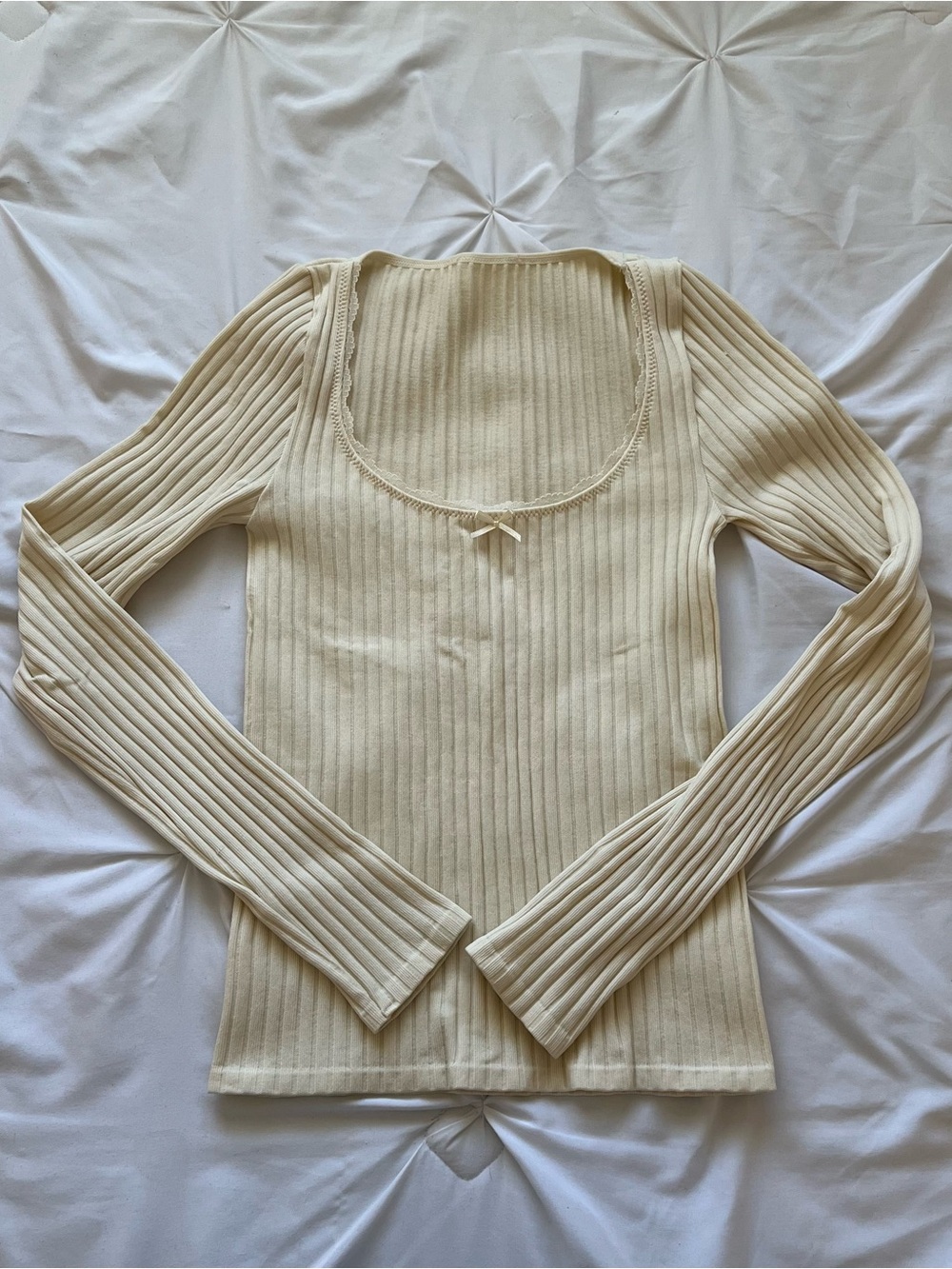 Cream lace trim ribbed long sleeve top with a cute bow